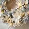 Glitzhome® 24" Pre-Lit Snow Flocked Greenery Pine Poinsettia Christmas Wreath